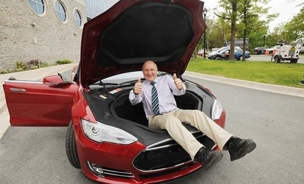 Jeff Dahn celebrating in a Tesla